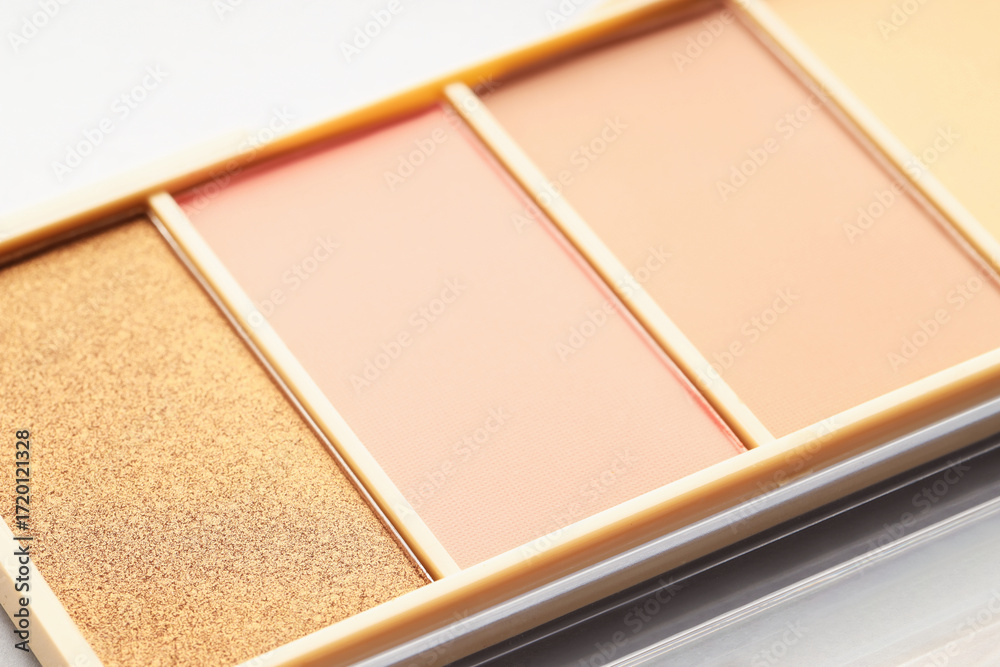 Fototapeta premium Beautiful eyeshadow palette on white background, closeup