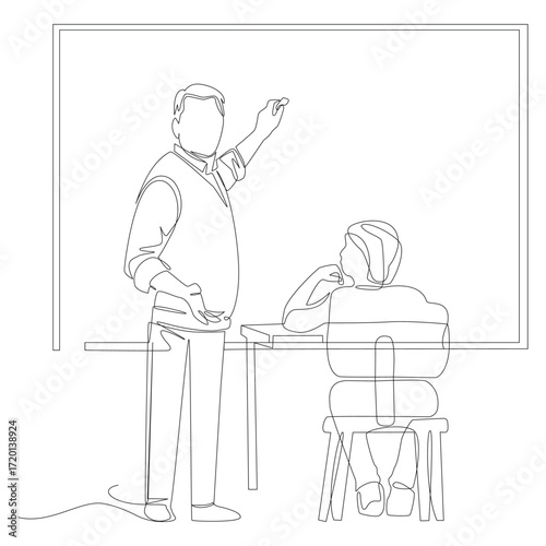 Teacher writing on blackboard with student sitting at desk in classroom education teaching