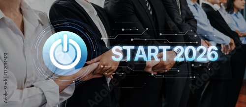 Tableau sur toile Diverse group of business professionals standing together, symbolizing teamwork and innovation while looking ahead to new opportunities and goals for 2026