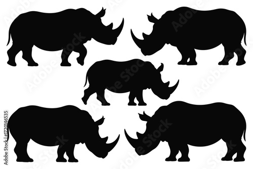 Collection of five black rhinoceros silhouettes in various poses on a white background silhouette