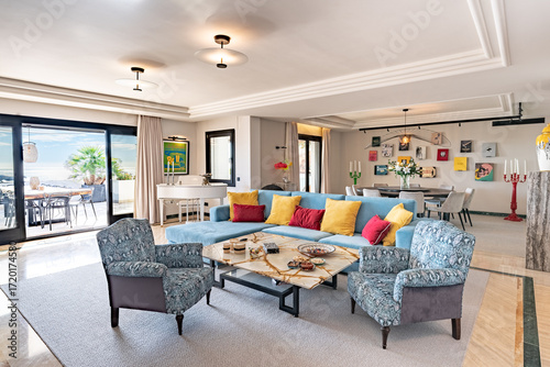 Modern Open Concept Living Room with Colourful Decor and Sea View in mediterranean penthouse 