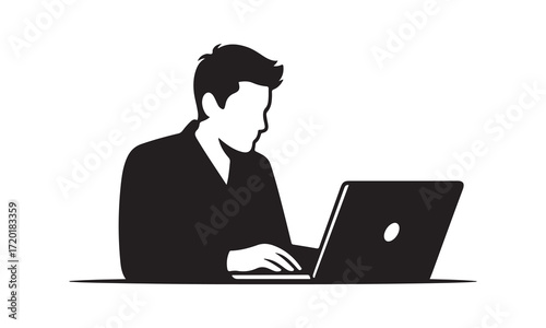 Silhouette of a freelancer working on a laptop computer