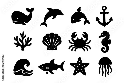 Marine animals and ocean icons set in silhouette style for nautical design