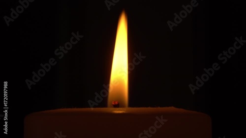 Old dusty candle in the dark