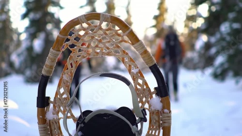 Snowshoeing in a snowy forest
