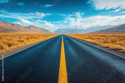 A long road winding through mountains.