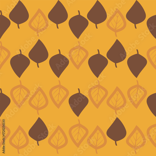 Vibrant autumn seamless pattern with brown and orange maple leaves scattered on a bright yellow background. Flat design, ideal for fabric and seasonal decor