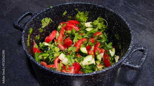 Cucumber tomato salad in the pot