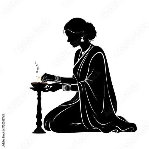 Indian woman in sari lighting a diya silhouette isolated on white background