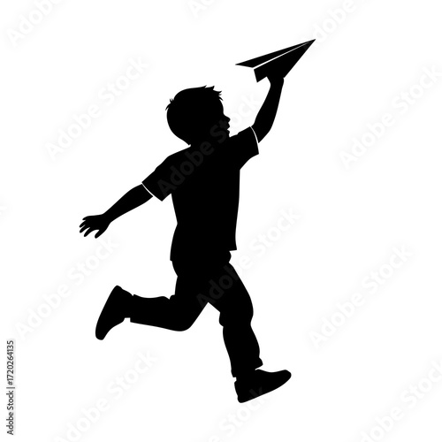 Silhouette of a boy running and throwing a paper airplane isolated on white background