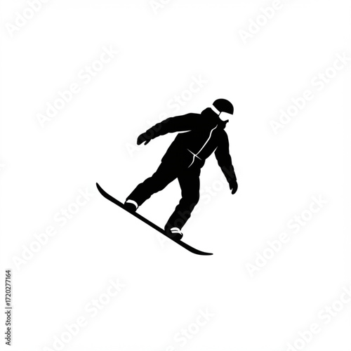 Snowboarder performing a downhill maneuver on a snowy slope  