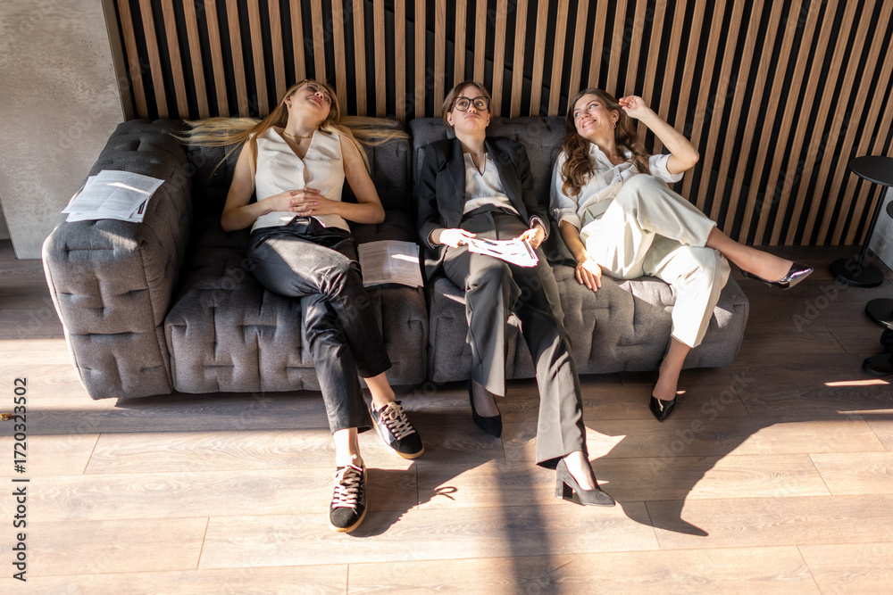 custom made wallpaper toronto digitalBusinesswomen relaxing after work in stylish office lounge, satisfied with completed tasks