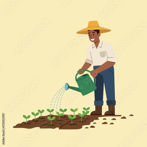Farmer watering young plants with watering can
