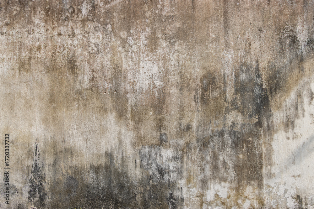 Obraz premium Grungy weathered concrete wall with cracks and stains, exuding a raw, aged texture background