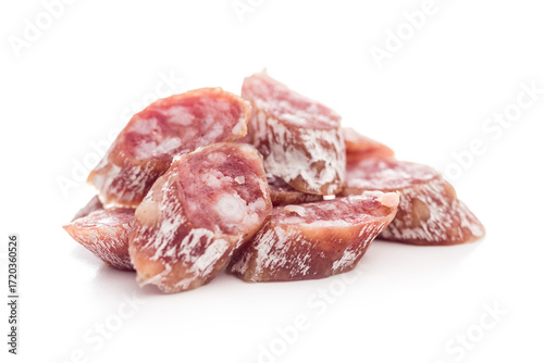 Sliced fuet sausage with mold isolated on white background.