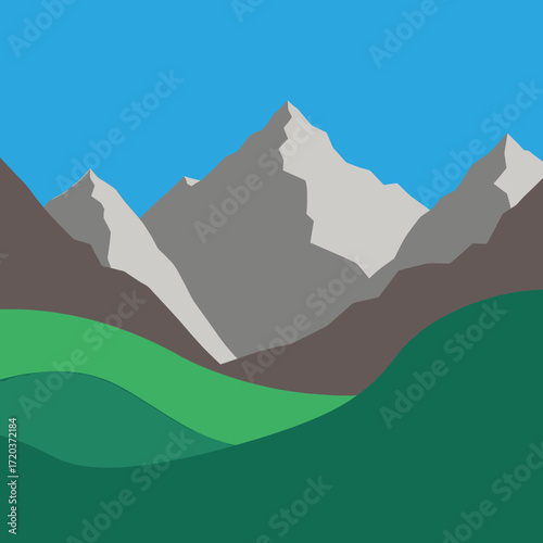 Mountain landscape with green valleys and a clear blue sky.