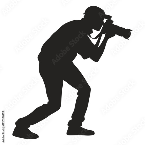 Photographer crouched for macro shot silhouette