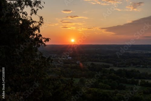 A breathtaking sunset over the scenic Mt Nemo in Burlington, Ontario, capturing the vibrant colors and serene landscape.