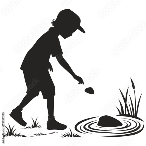 Child tossing stone in pond silhouette