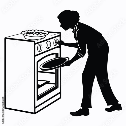 Baker placing pie in oven silhouette