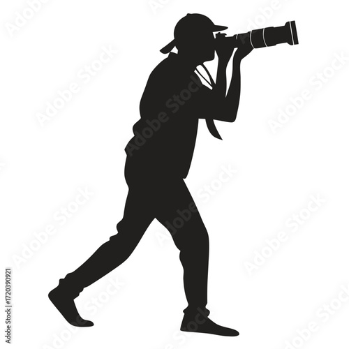 Photographer using long lens silhouette