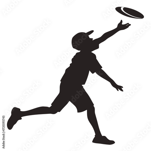 Boy catching frisbee silhouette