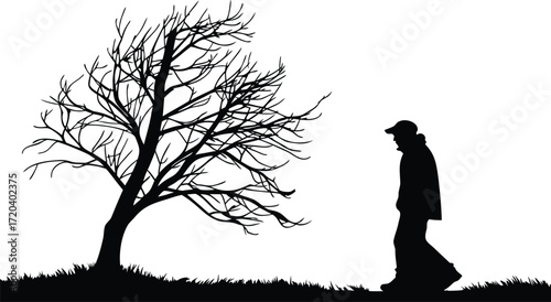 Silhouette of a person walking past a bare tree on a grassy hill Keywords: person, silhouette