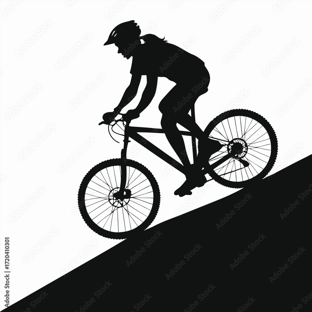 Fototapeta premium Cyclist coasting downhill silhouette