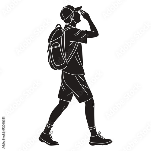 Hiker shielding eyes from sun silhouette