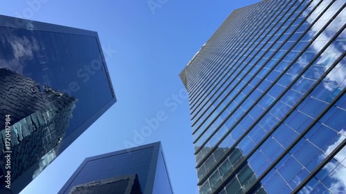 timelapse of moving clouds reflecting in glass fronts of office buildings in Puerto Madero, Buenos Aires, Argentina