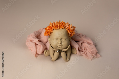 Newborn photography prop doll with floral headdress