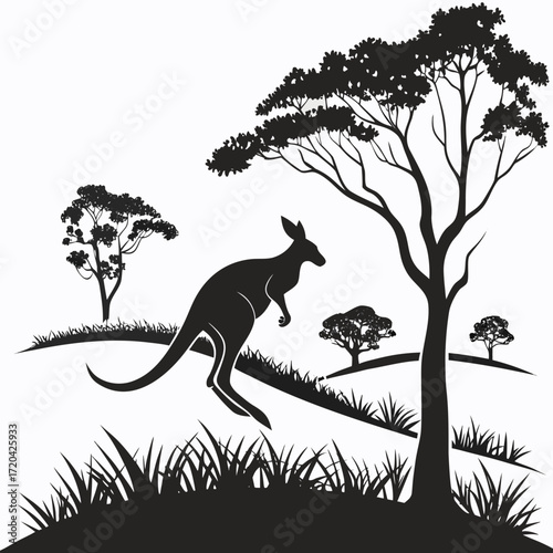 Kangaroo hopping through outback silhouette