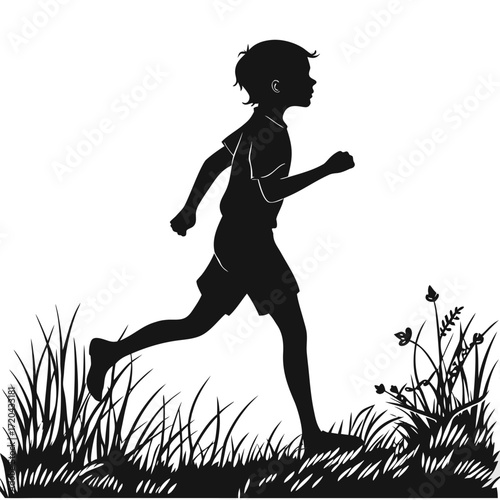 Child running barefoot through grass silhouette