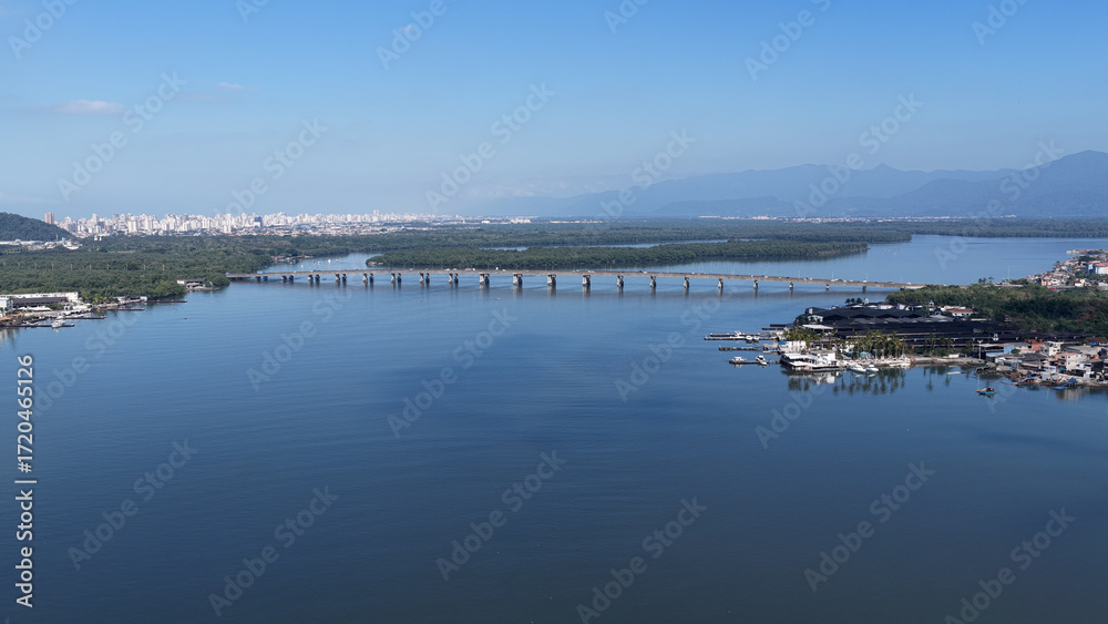 Fototapeta premium Pensil Bridge At Sao Vicente In Sao Paulo Brazil. Beach Landscape. Downtown Seascape. Travel Destination. Pensil Bridge At Sao Vicente In Sao Paulo Brazil. Cable Bridge Skyline.