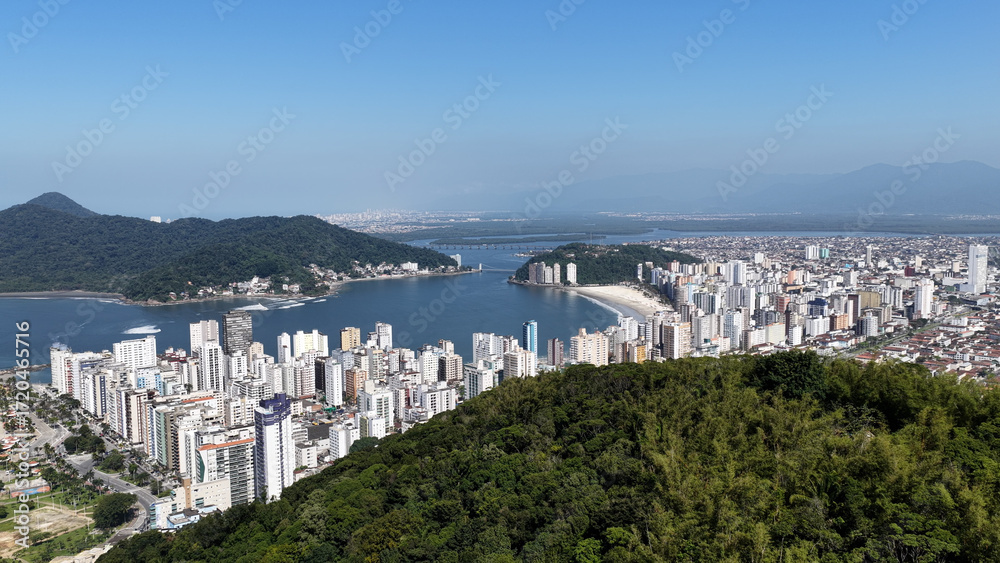 Obraz premium Jose Menino Hill At Sao Vicente In Sao Paulo Brazil. Beach Landscape. Downtown Seascape. Travel Destination. Jose Menino Hill At Sao Vicente Brazil. Sao Vicente Bay Skyline. Summer Tropical.