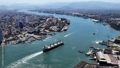 Freight Ship At Santos In Sao Paulo Brazil. Port Of Santos Scenery. Cargo Ship. Maritime Transportation. Freight Ship At Santos. Freight Ship Sailing.