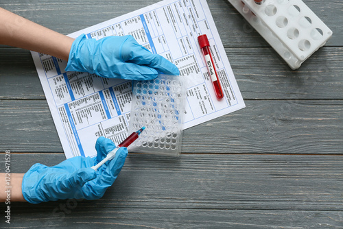 Doctor with syringe and HIV...