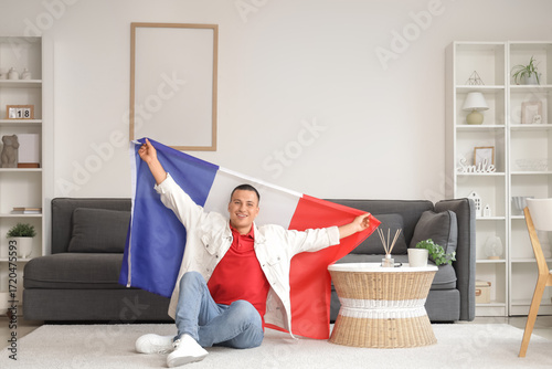 Young man with flag of Fran...