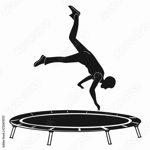 Gymnast flipping on trampoline silhouette