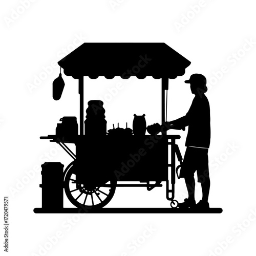 Silhouette of a street food vendor at a cart with an awning