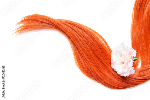 Red hair strand and flower ...