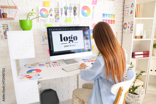 Female graphic designer wor...