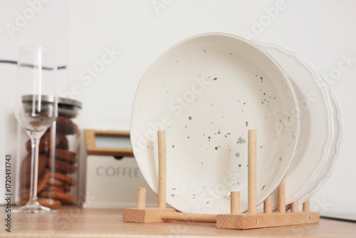 Stand with plates on counte...