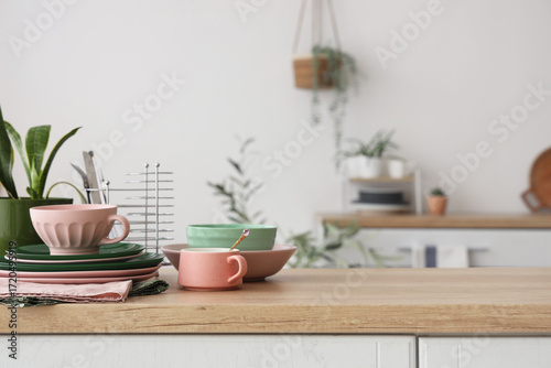 Wallpaper Mural Cups, plates and napkin on counter in kitchen. Closeup Torontodigital.ca