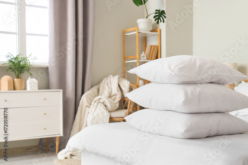 Stack of clean white pillow...