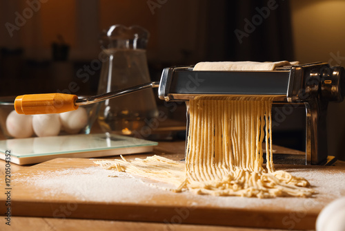 Pasta machine with dough on...
