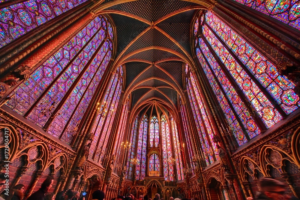 Obraz premium Wonderful stained glass windows inside the Sacred Chapel next to Notre Dame Cathedral on the Ile de la Cite, Paris, France.