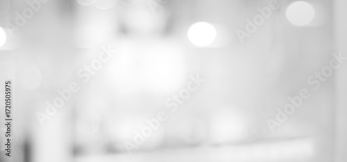 Blur white abstract background, blurred grey gradient bright light with copy space backdrop, banner, blank modern business office interior hallway building design background, monochrome