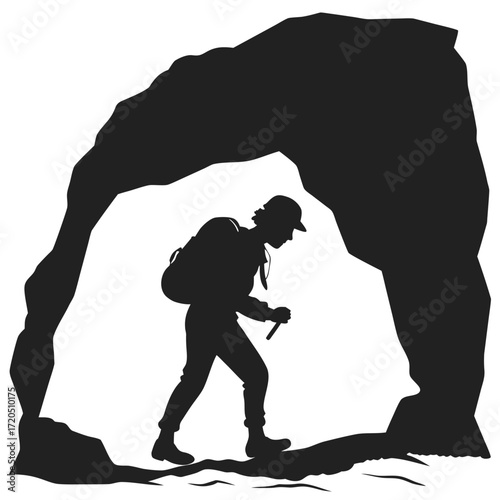 Cave explorer entering cave silhouette
