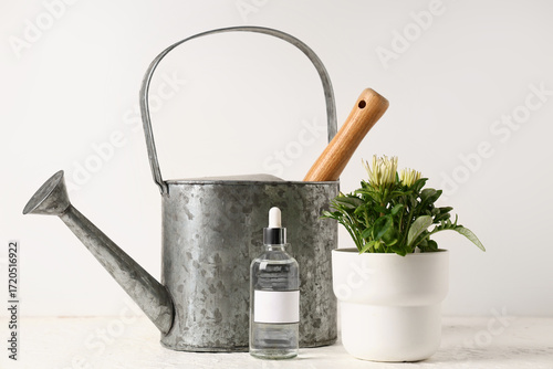 Bottle of plant fertilizer ...